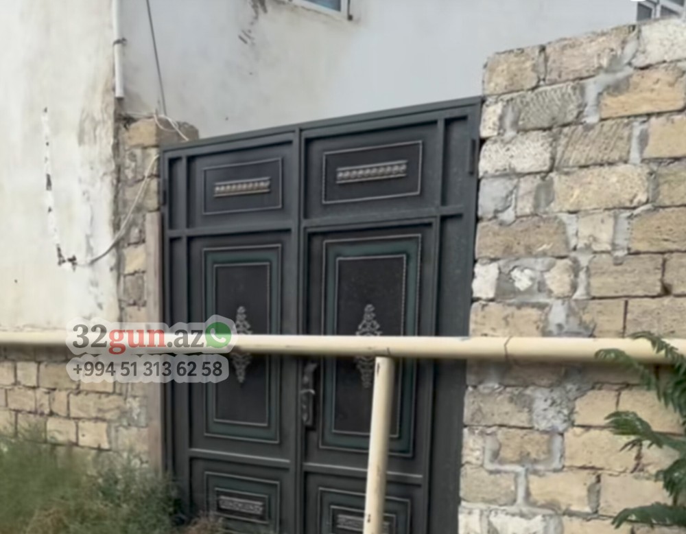 Qapının ortasından keçən qaz borusu sosial şəbəkələrdə gündəm oldu